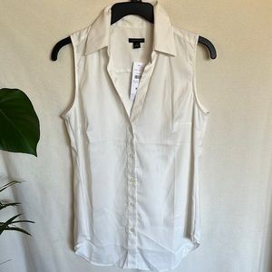 Ann Taylor NWT - cream colored sleeveless button up blouse. Size XS